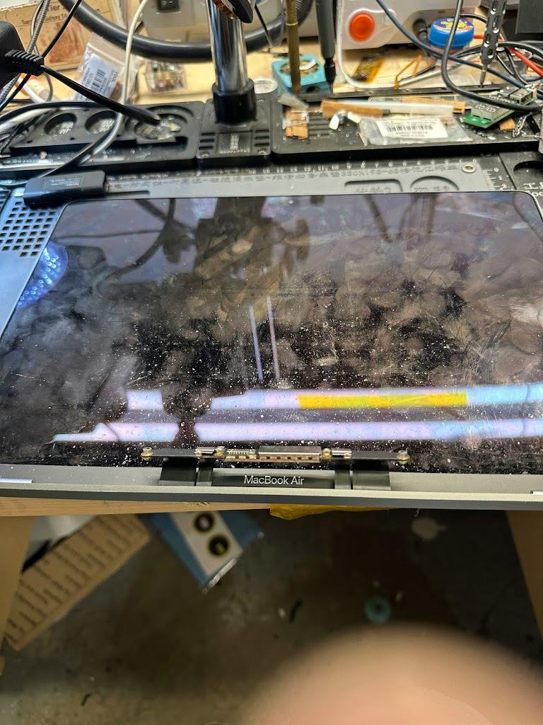 Cracked MacBook Air screen on the repair bench at iDoctor AZ in Tempe